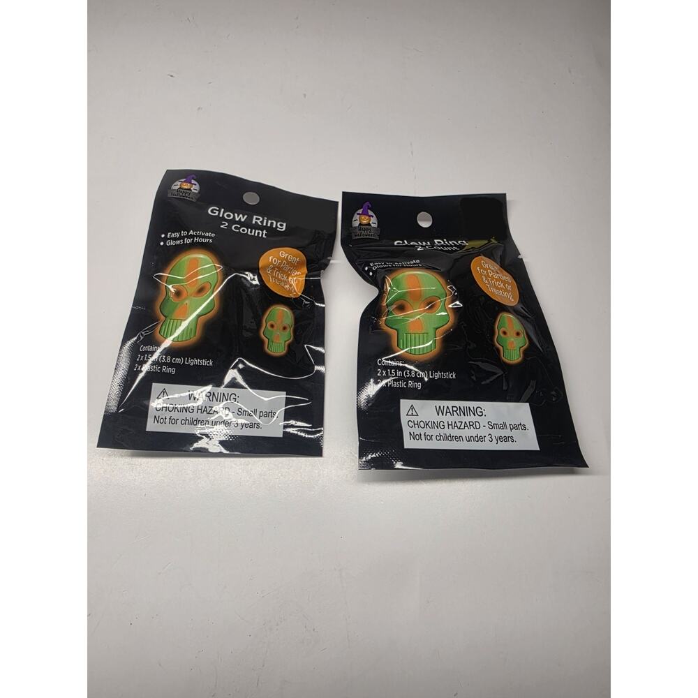 Happy Halloween Lot of 2 Packs of Glow Rings (4 Rings Total) Skulls - NEW
